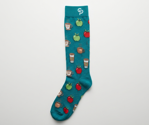 Teal sock with coffee cup and apple pattern on a white background